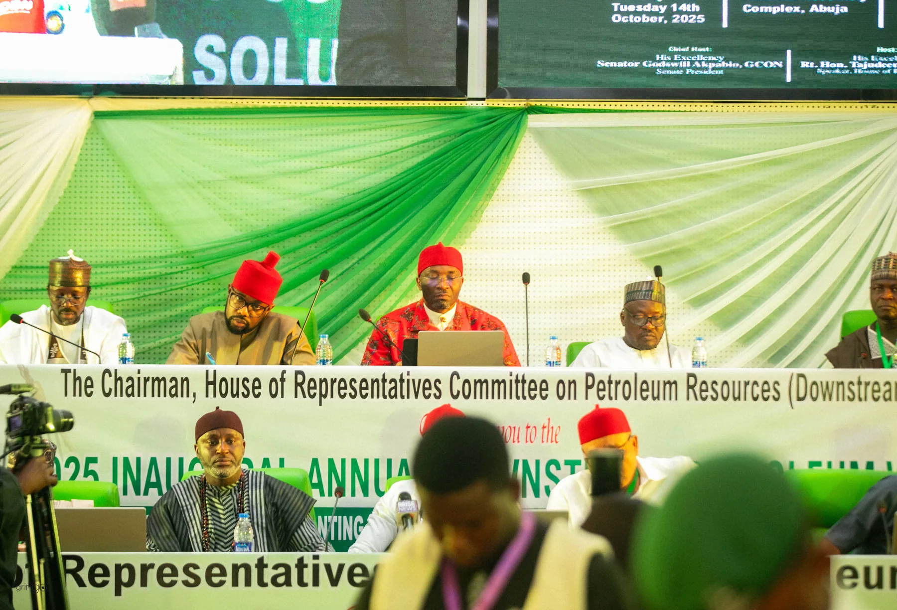 Dignitaries exchanging handshakes at the 2025 Downstream Week high table (Day 1)